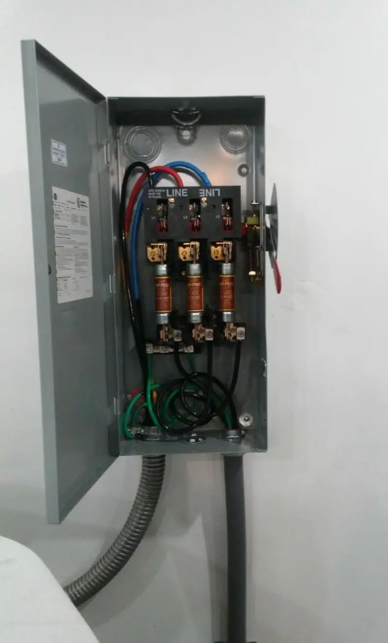 Three-phase disconnect switch installed for Smoke Detector Installation in Norton